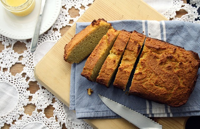 fresh homemade bread loaf golden crust on cooling rack with flour dusting