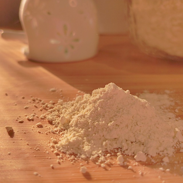baking foundations course ingredients flour eggs butter measuring cups on wooden counter